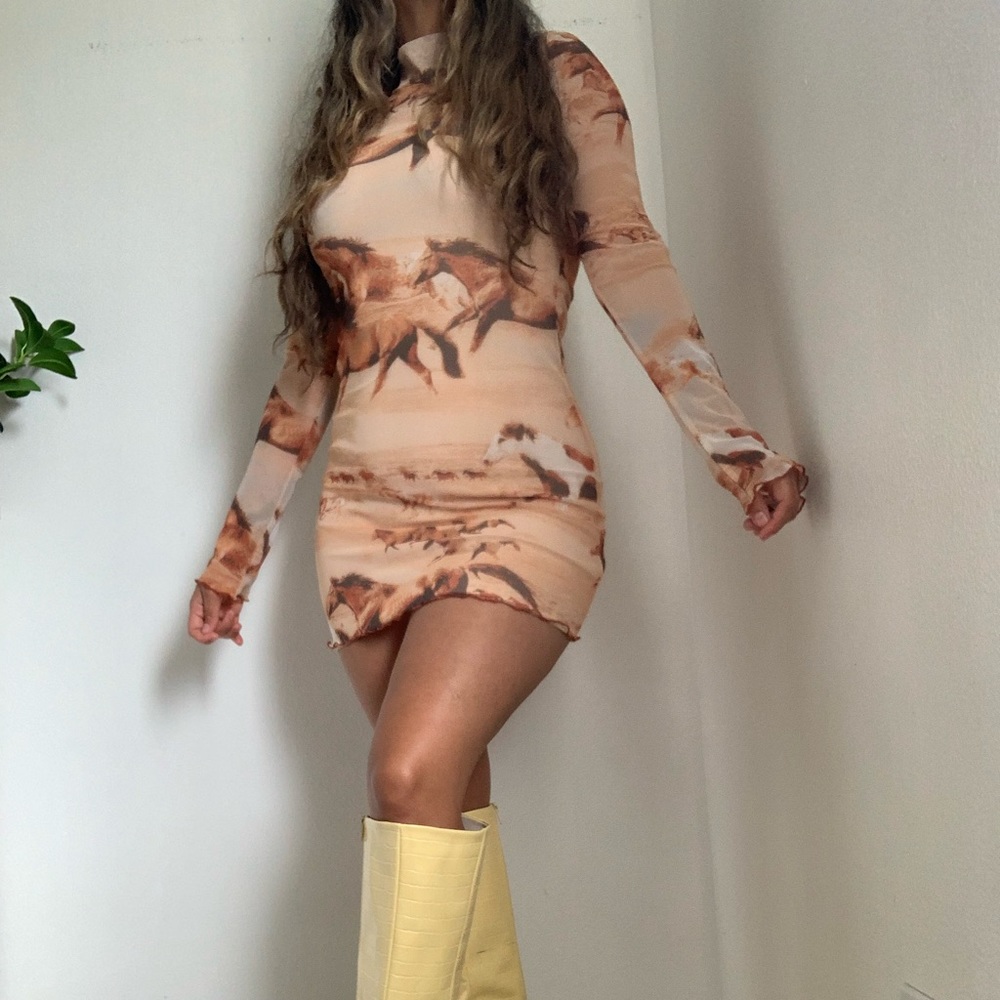 URBAN OUTFITTERS 🌻.   Nude with brown horse print !